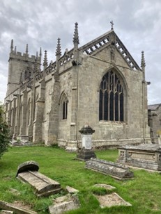 A view of the east front of the church and part of the churchyard