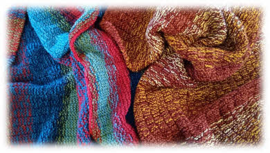 Two of the prayer shawls that have been knitted with prayer and love and donated to our ministry.